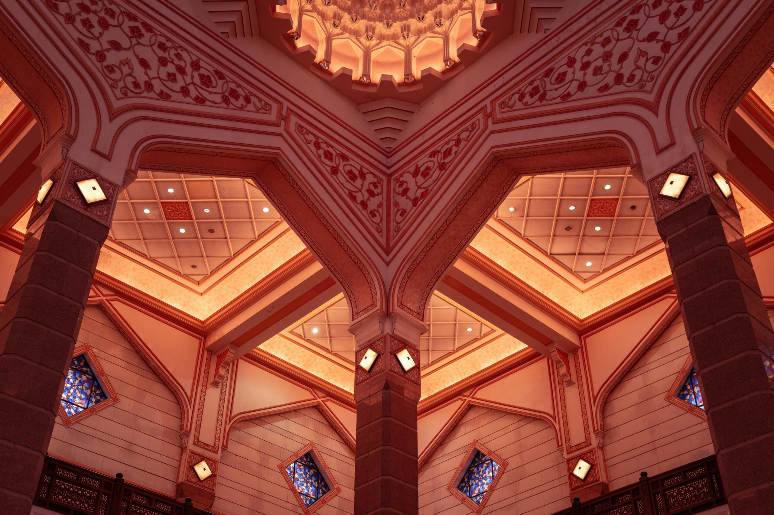 Explore the intricate Islamic architecture of Putra Mosque in Malaysia, featuring beautiful geometric patterns.